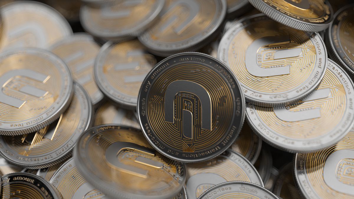 Close-up of multiple gold and silver cryptocurrency coins symbolizing digital currency and finance.